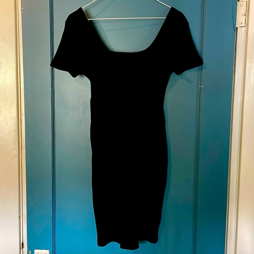 Never worn, fitted dress, mid length.